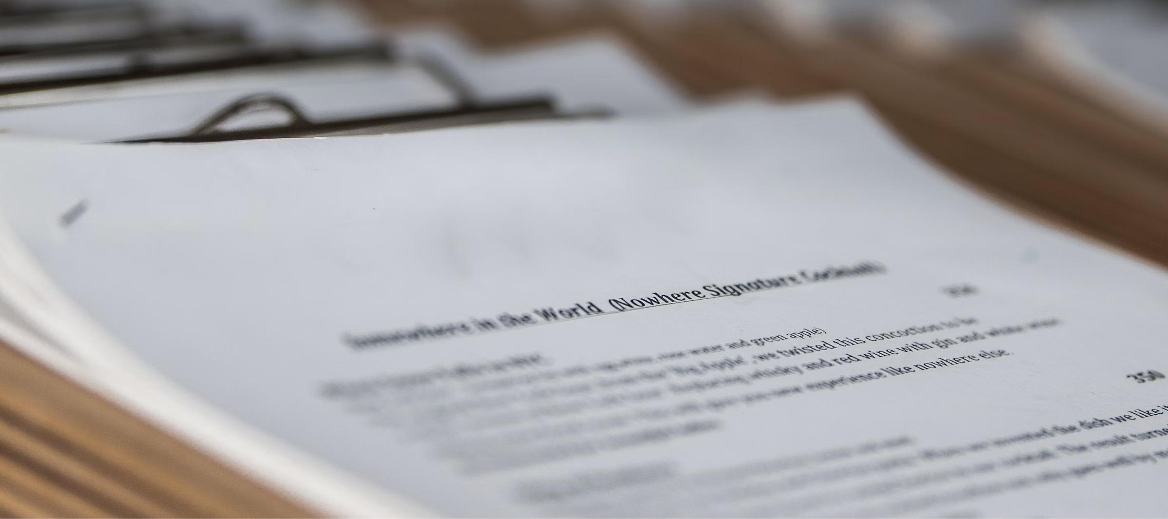 capital markets Capital markets law: close-up of printed financial documents on clipboards