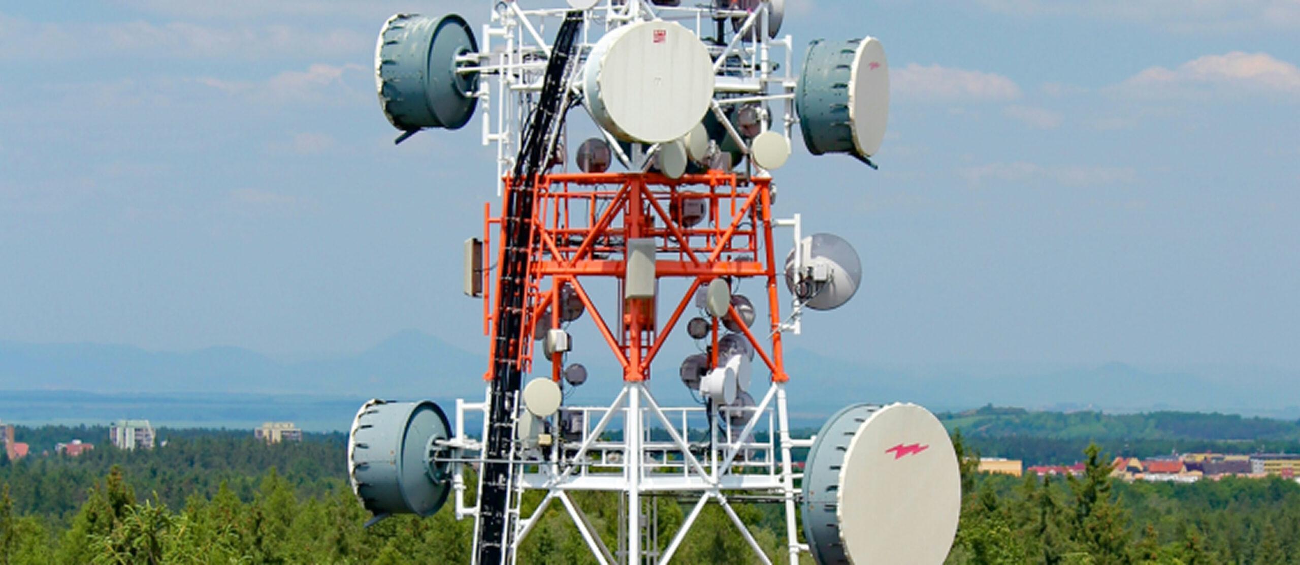 telecommunications Telecommunications law: tower with microwave dishes